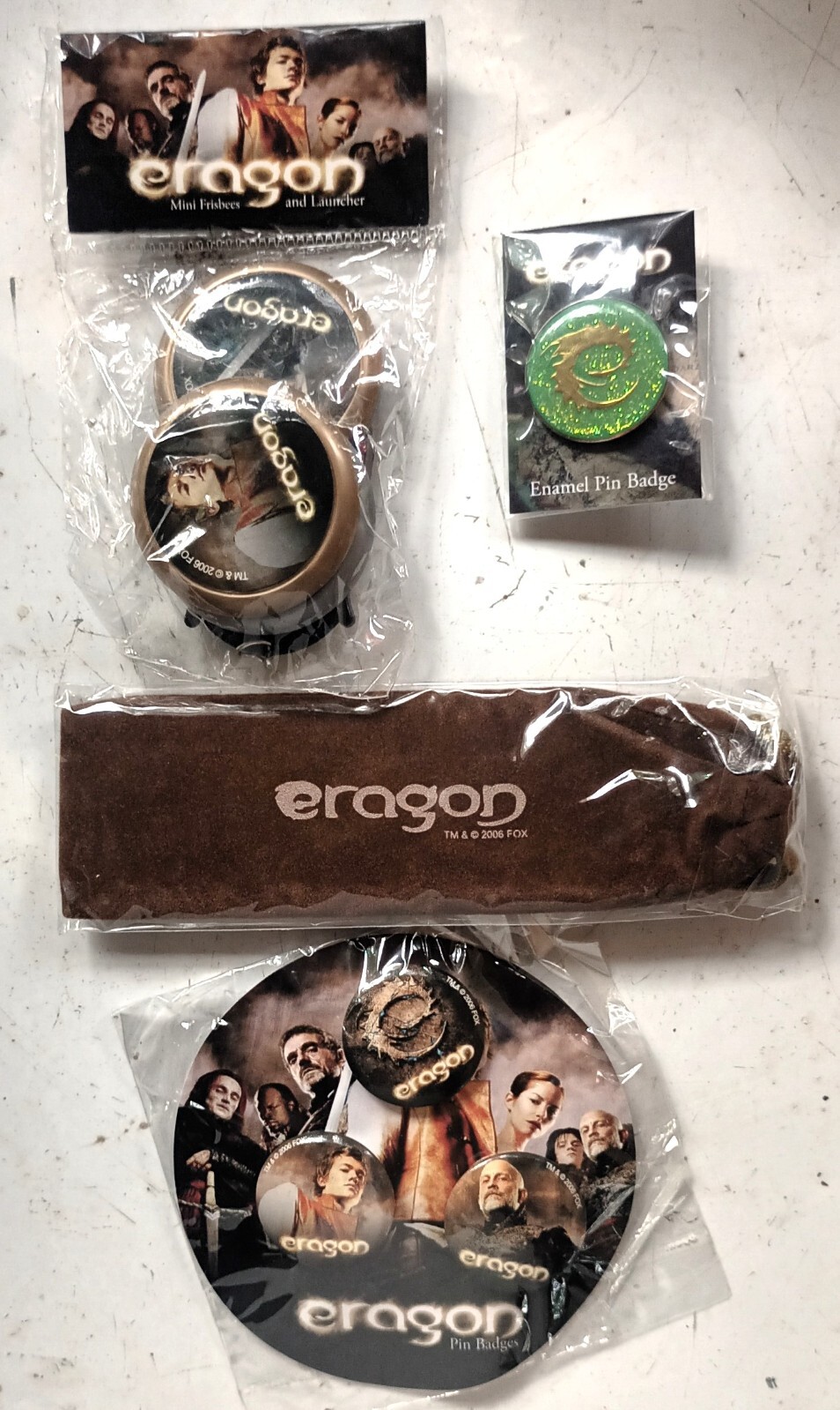 ERAGON - SET OF 4 PROMO ITEMS BADGES; BOOK MARK etc. MOVIE TIE-IN new & sealed