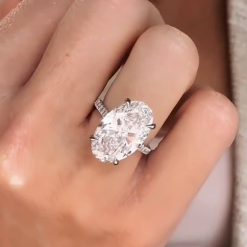 6.3 TCW Oval Cut Moissanite Hidden Halo Engagement Ring In 14k White Gold Plated