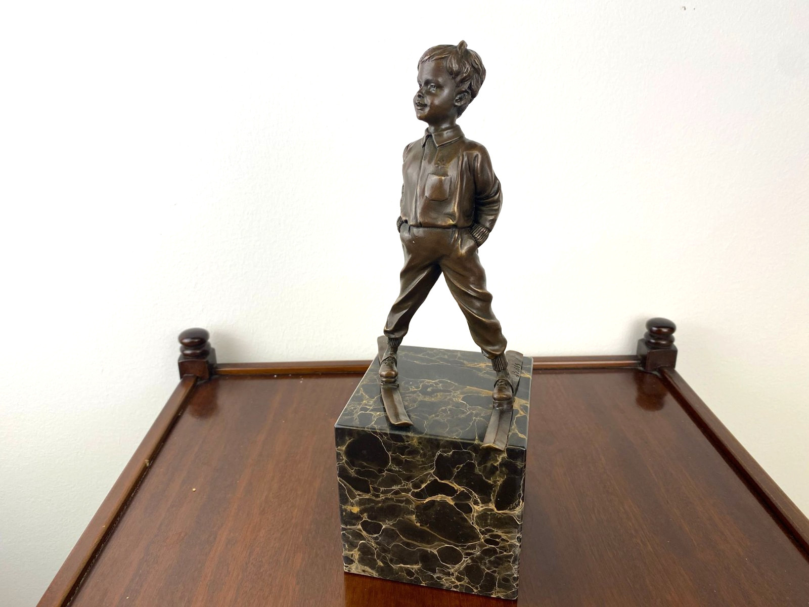 Bronze sculpture boy with ski on marble base after Ferdinand Preiss