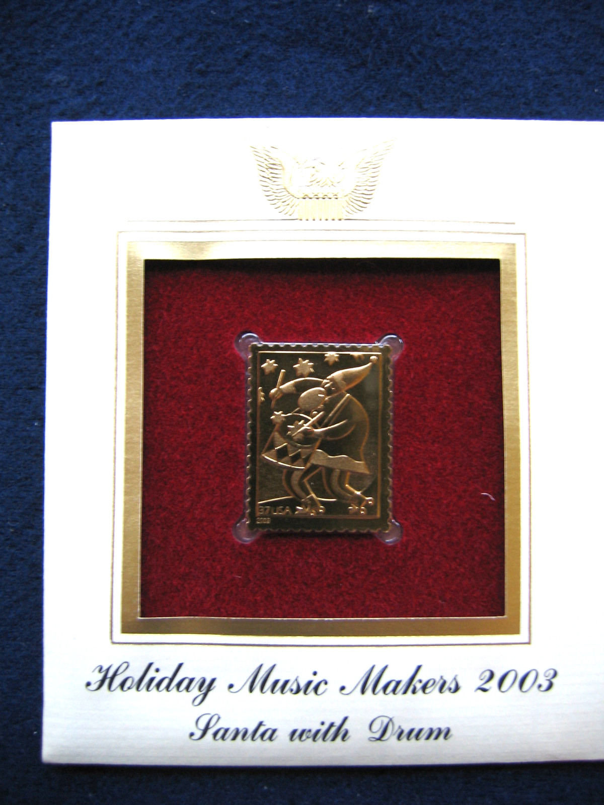 2003 Holiday Music Makers Santa With Drum Replica Gold Golden Cover Stamp