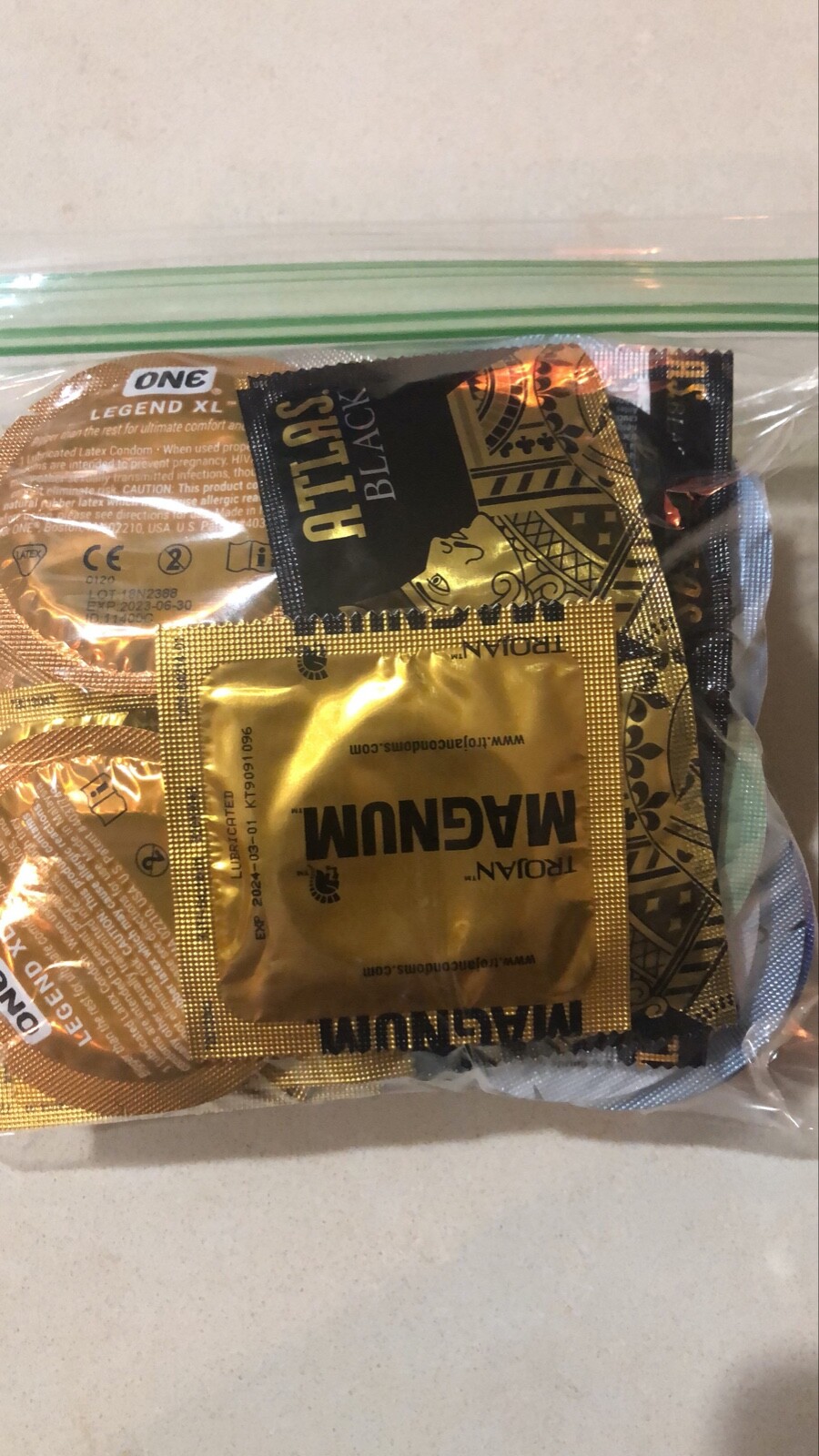 100 CONDOMS - Mixed magnums, atlas, Ones xl, and more