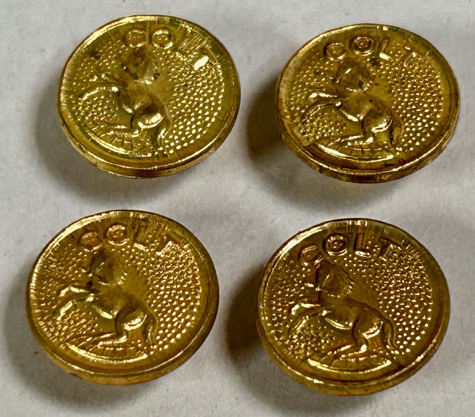 Lot Of "4" UNUSED Colt 1911 Gold Tone Pistol Grip Medallions (A4)