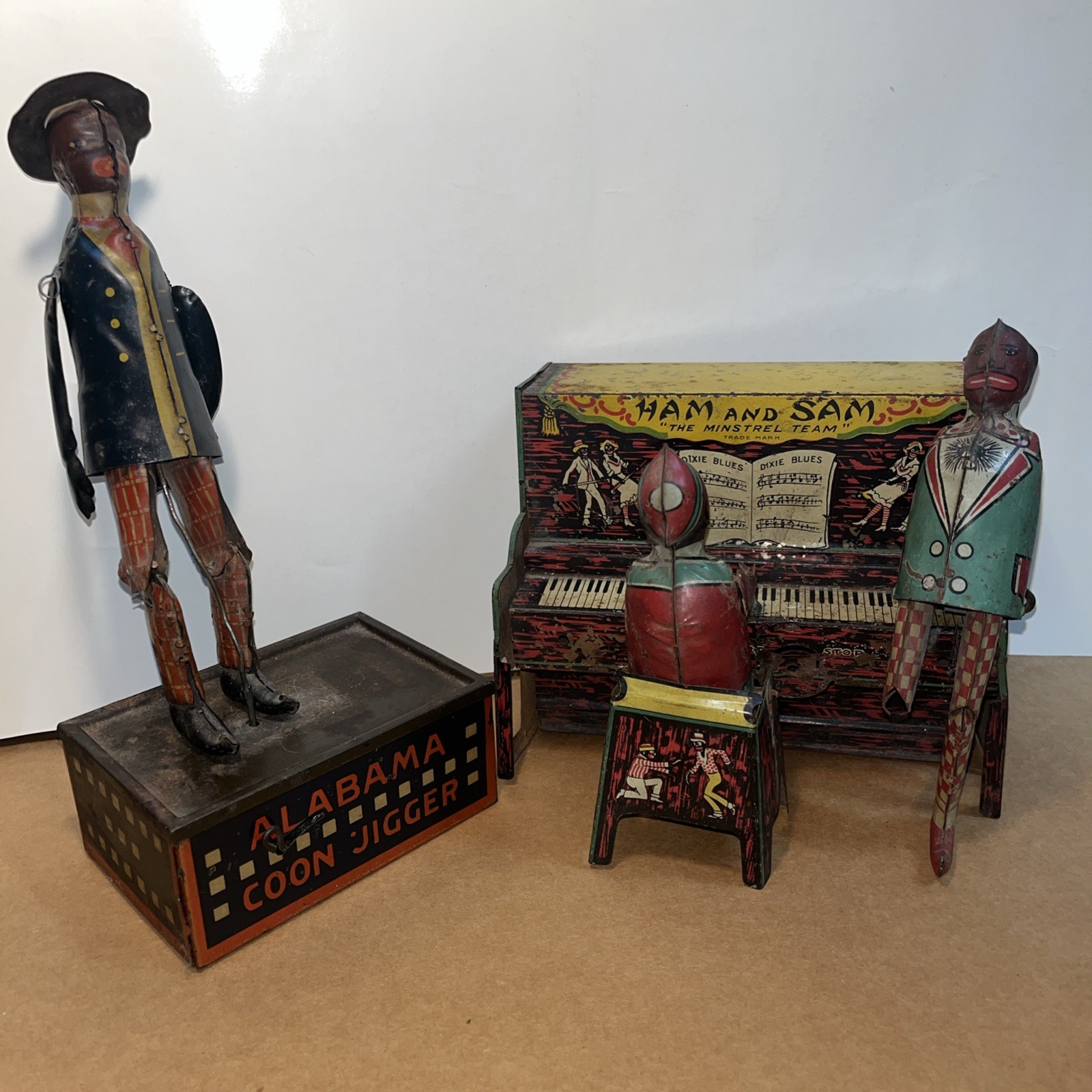 Set of 2 tin toys Ham and Sam The Minstrel Team & “TOMBO “Alabama Coon Jigger