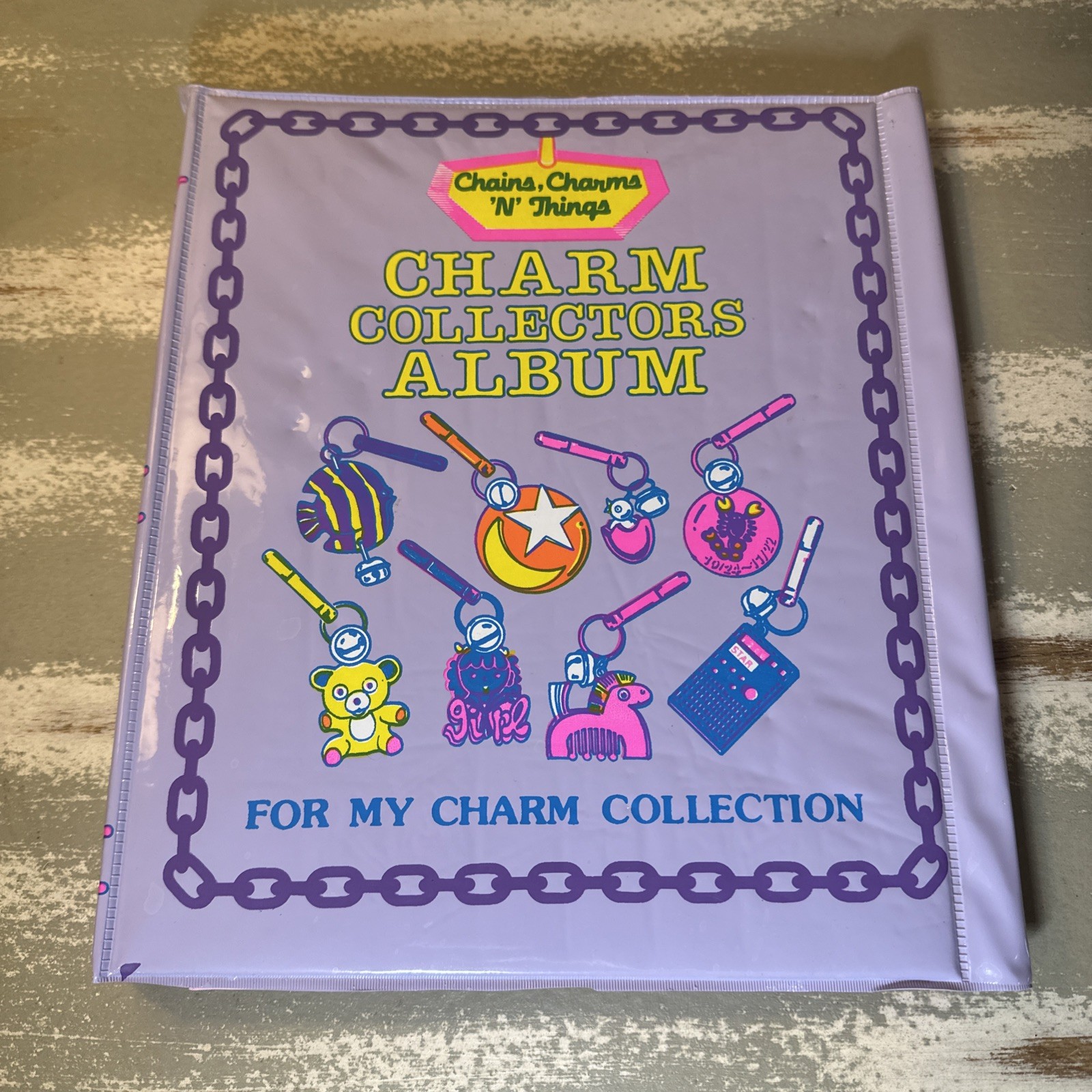 Retro Vintage 1985 Plastic Clip Bell Charms Charms Album NOS New Old Stock!!!