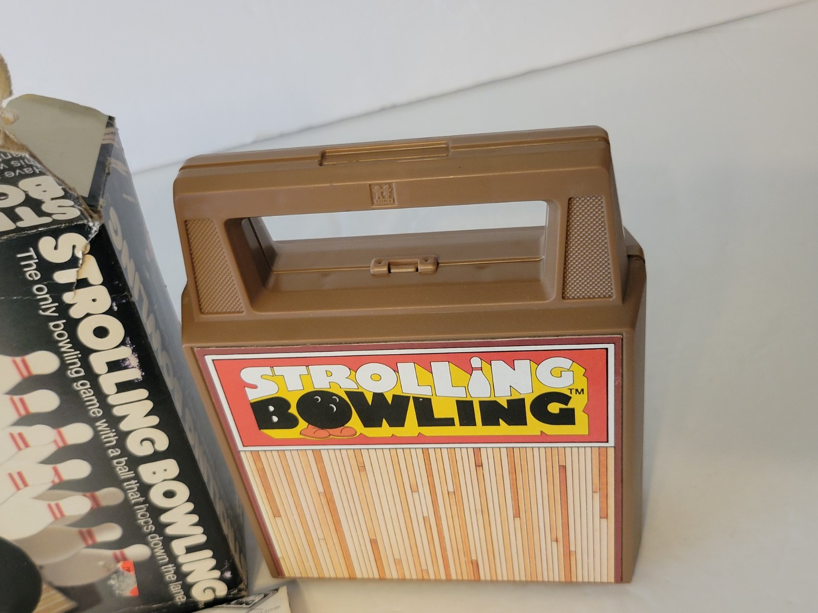 VINTAGE 1980s TOMY WIND UP STROLLING BOWLING GAME WITH BOX WORKING