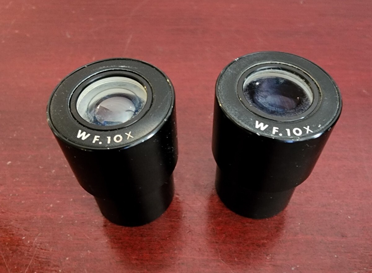 PAIR(2) OF WF.10X MICROSCOPE EYEPIECES. NO CRACKS OR CHIPS. WORKS