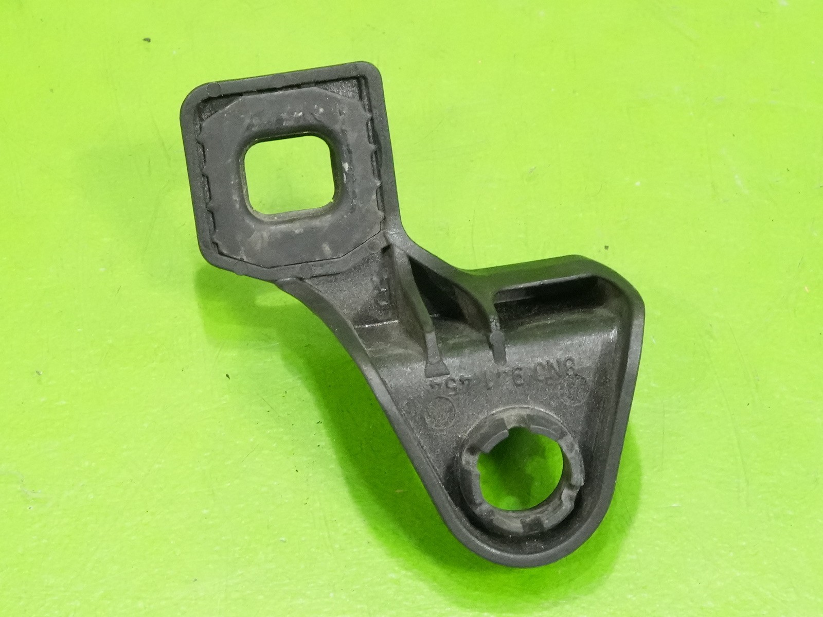 00-06 Audi TT OEM 8N0941454 passenger front headlight lamp bracket mount tab