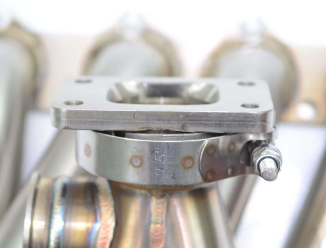 All Out Fab Precision turbo v-band to T3 adapter with hardware and clamp