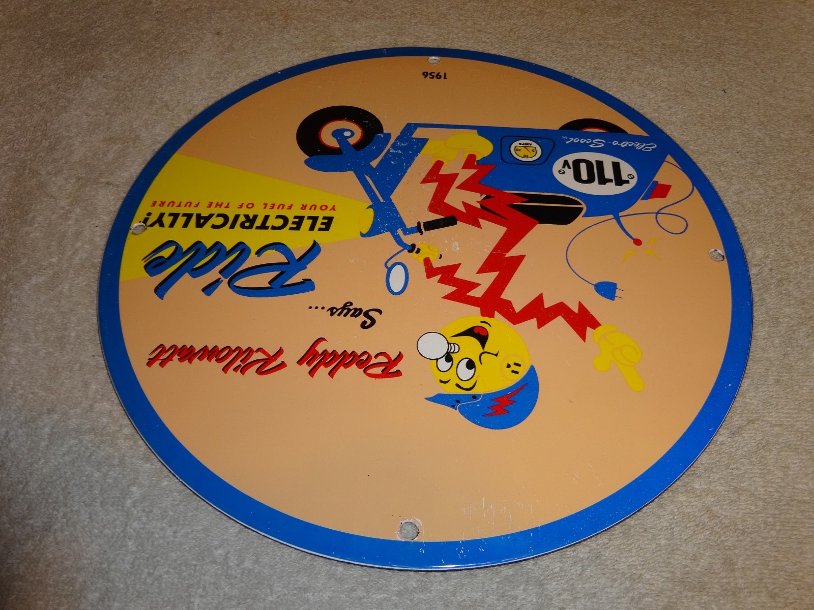 VINTAGE 56 REDDY KILOWATT ELECTRIC SCOOTER 11 3/4" PORCELAIN METAL GASOLINE SIGN