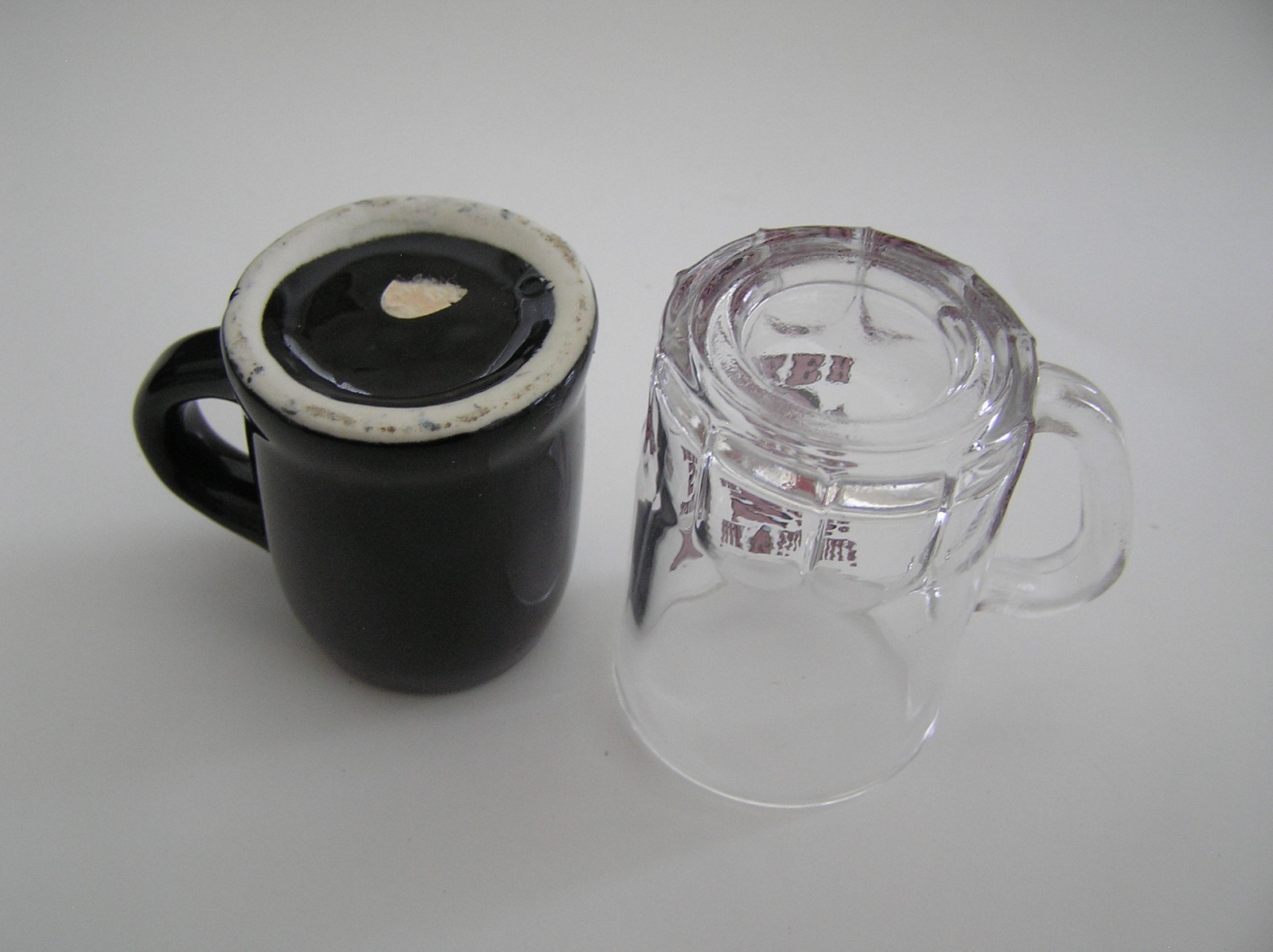 2 Souvenirs Shot Mugs: A Black Rumple Minze and A Clear Nashville 5cents Beer