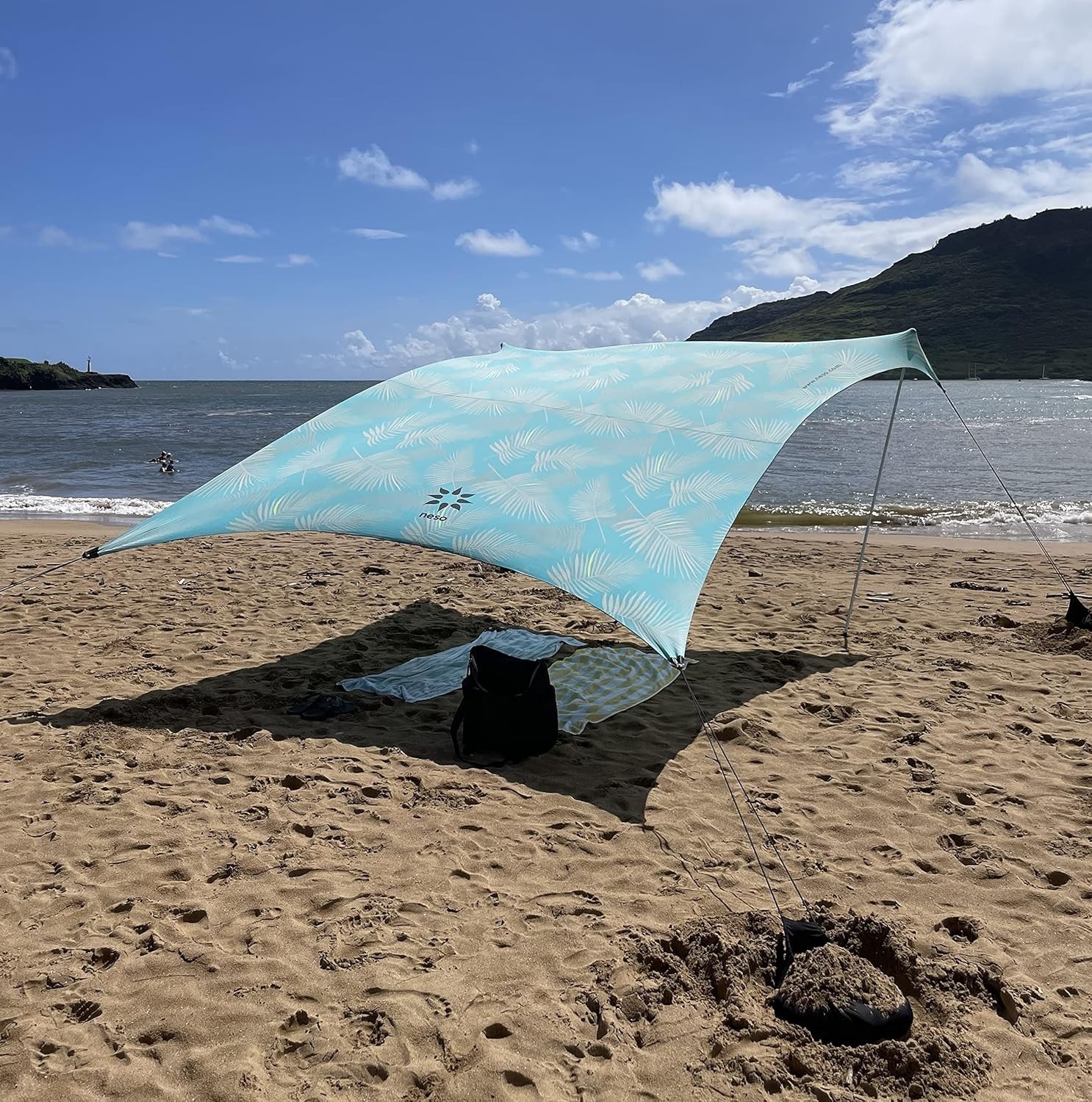Neso Beach Tent w/ Sand Anchor, Portable Sunshade 9x9 (Aqua Fronds) Description