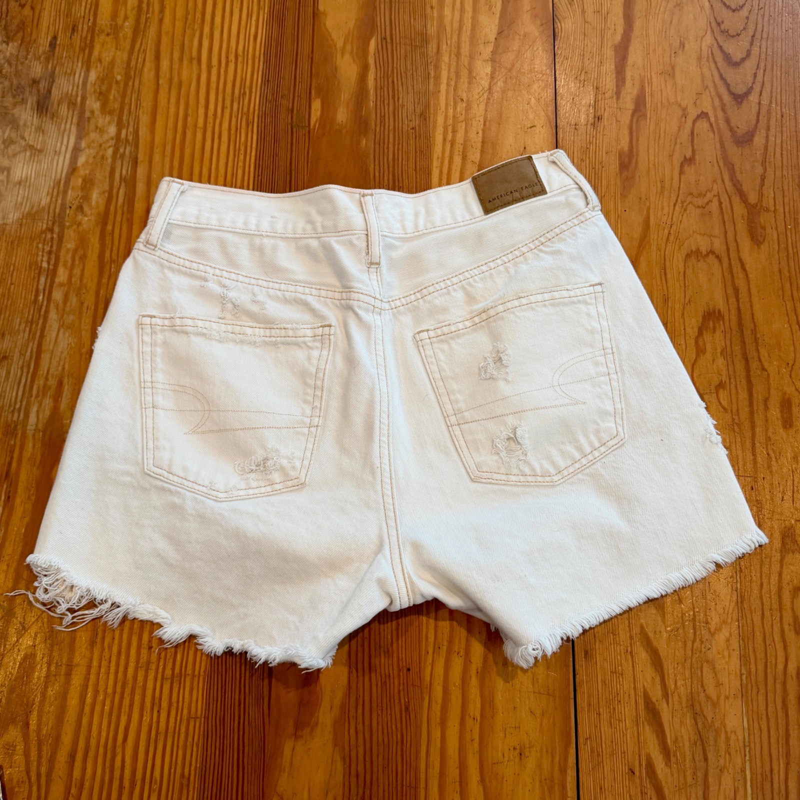 American Eagle White Distressed High Waisted Denim Shorts Size 4 Raw Hem
