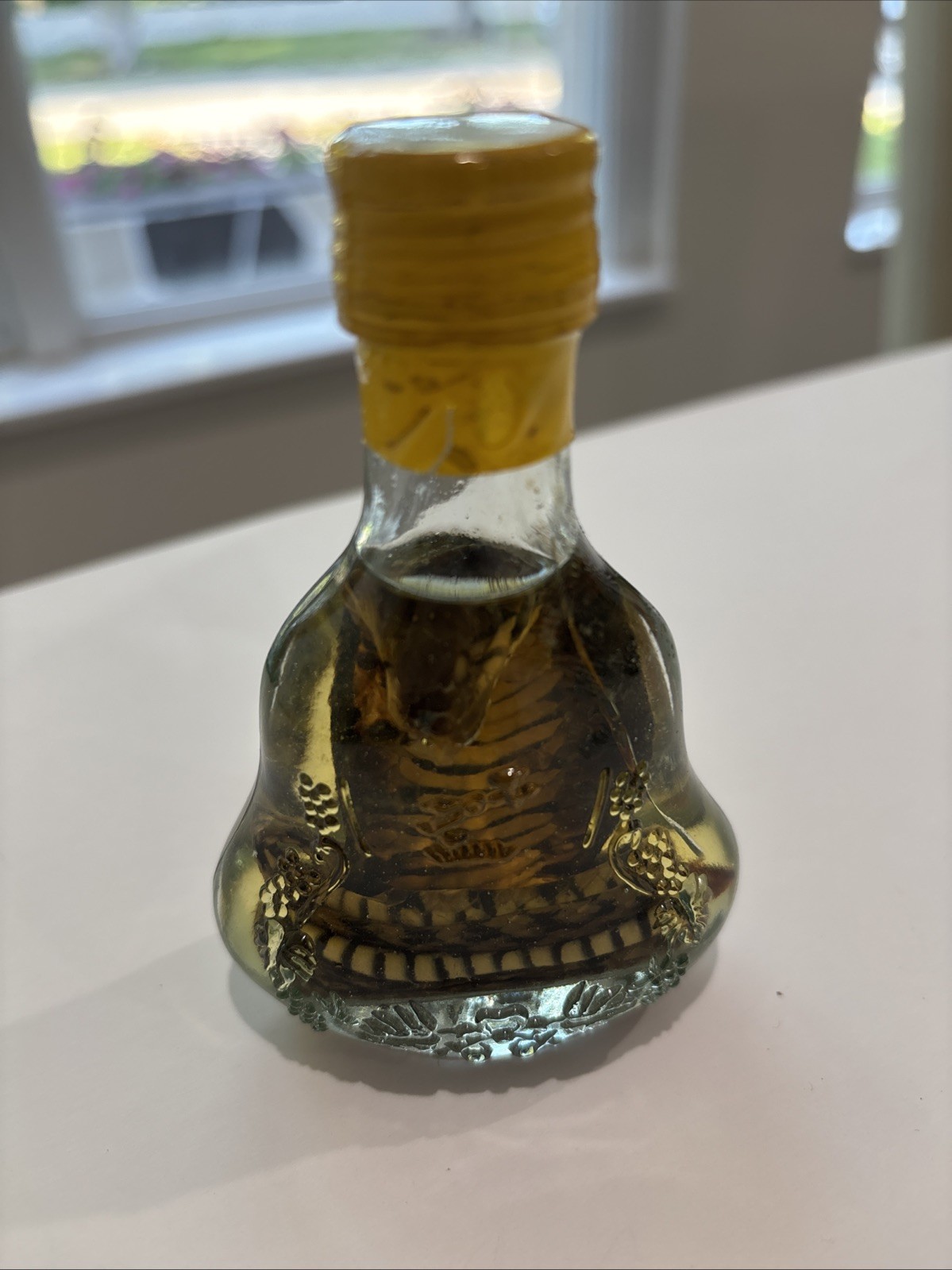 real cobra snake in a small X O glass bottle 4" tall