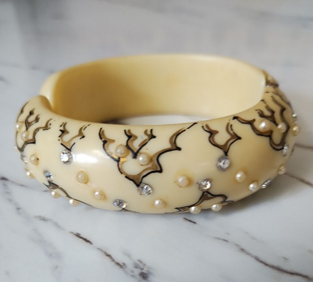 Mid century Thermoset plastic ivory clamper bracelet with rhinestones