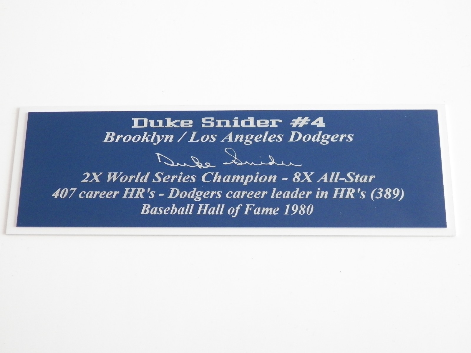 Connor Hellbuyck Team USA Gold Medal Autograph Nameplate Puck Jersey