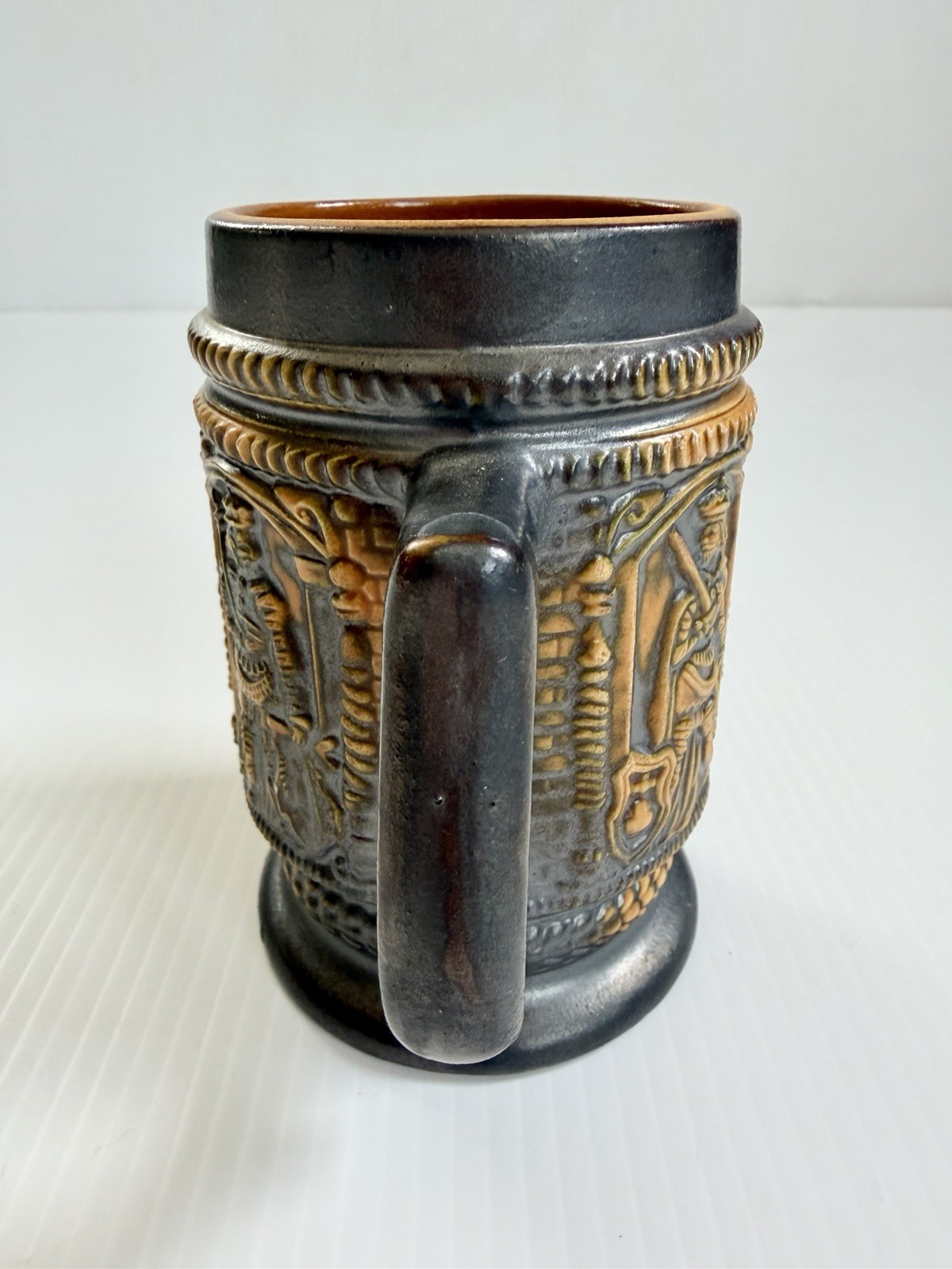 Vintage German Tankard Mug Beer Stein Brown/Orange Medieval Figures In Relief