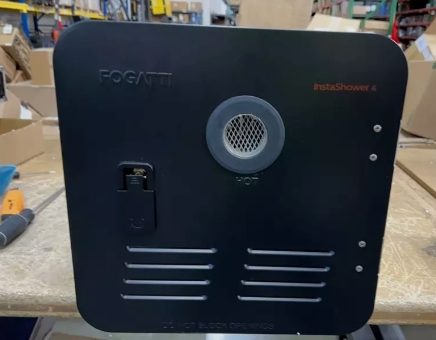 Used 2.5GPM RV Tankless Water Heater 48,000 BTU with 15x15 Black Door