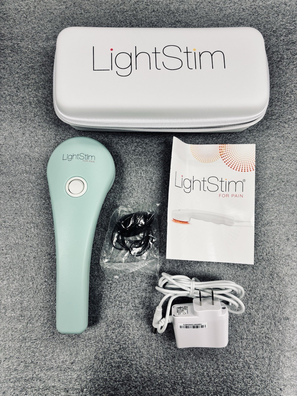 LightStim for Pain - LED light therapy device - Turquoise - New