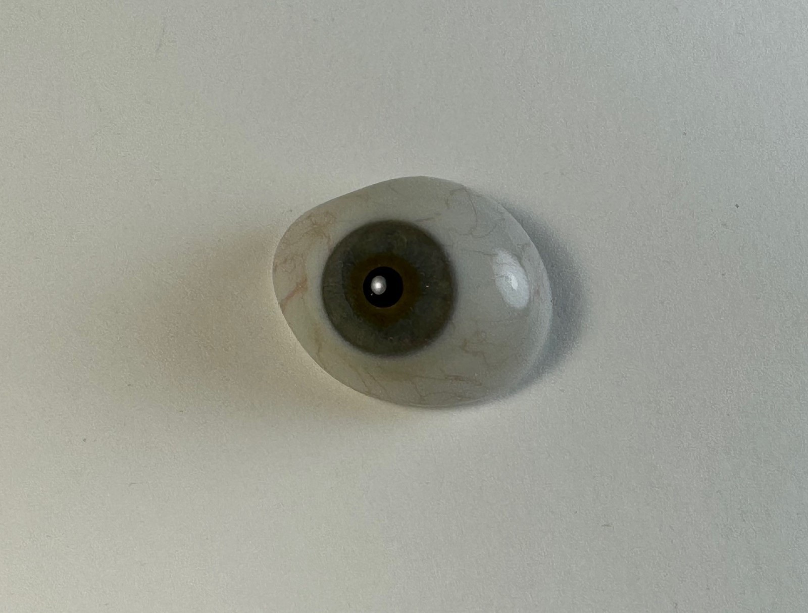Antique German hand-blown human prosthetic glass eye. Grey eye.