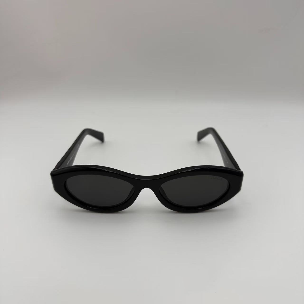 PRADA SPR26Z Black Sunglasses Polished Black Gray Tint Silver Logo