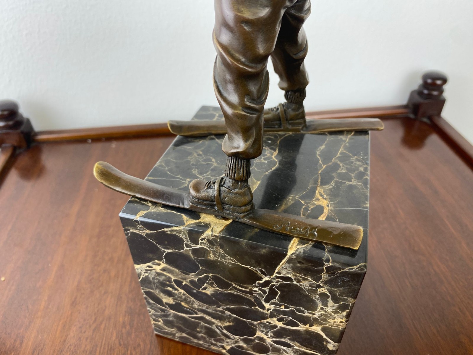 Bronze sculpture boy with ski on marble base after Ferdinand Preiss