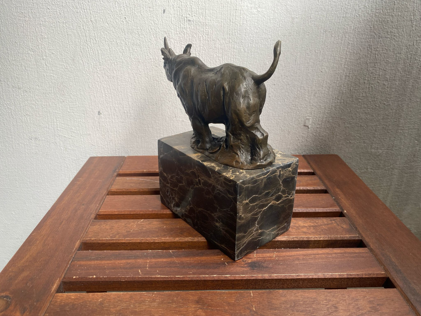 Bronze sculpture Walking Rhinoceros on a black marble base after Milo