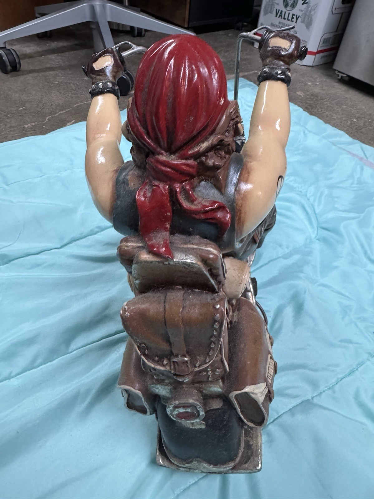 Vintage Motorcycle Figurine On Vintage Bike