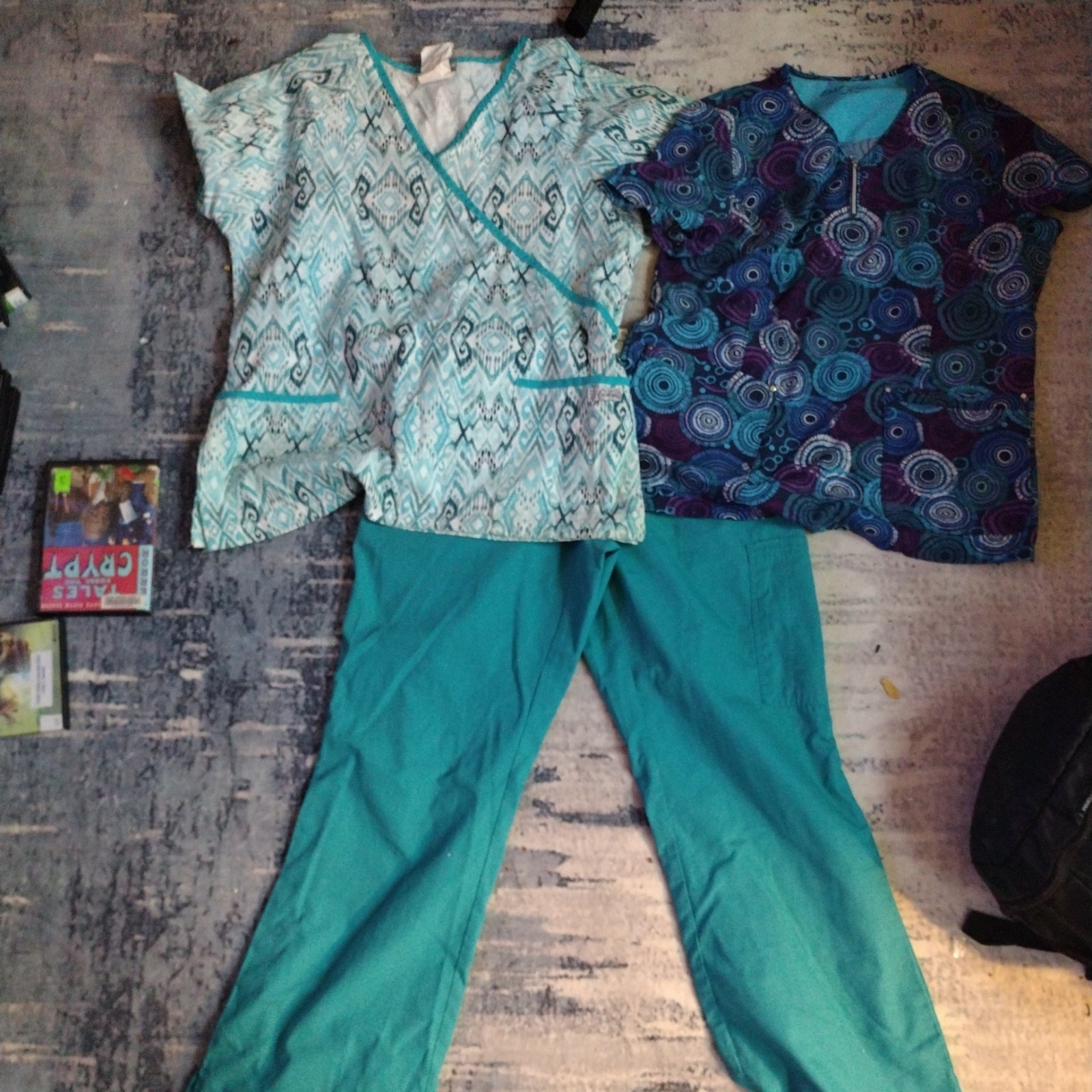 SET OF 2SCRUB TOPS AND MATCHING PANTS FOR BOTH IN MED.