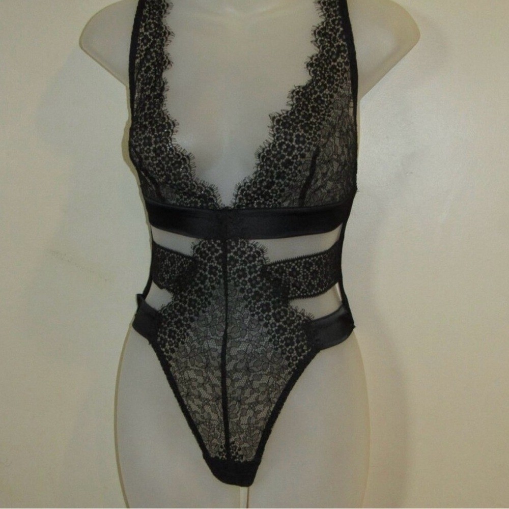 Victorias Secret Black Lace Thong Bodysuit. Size large.