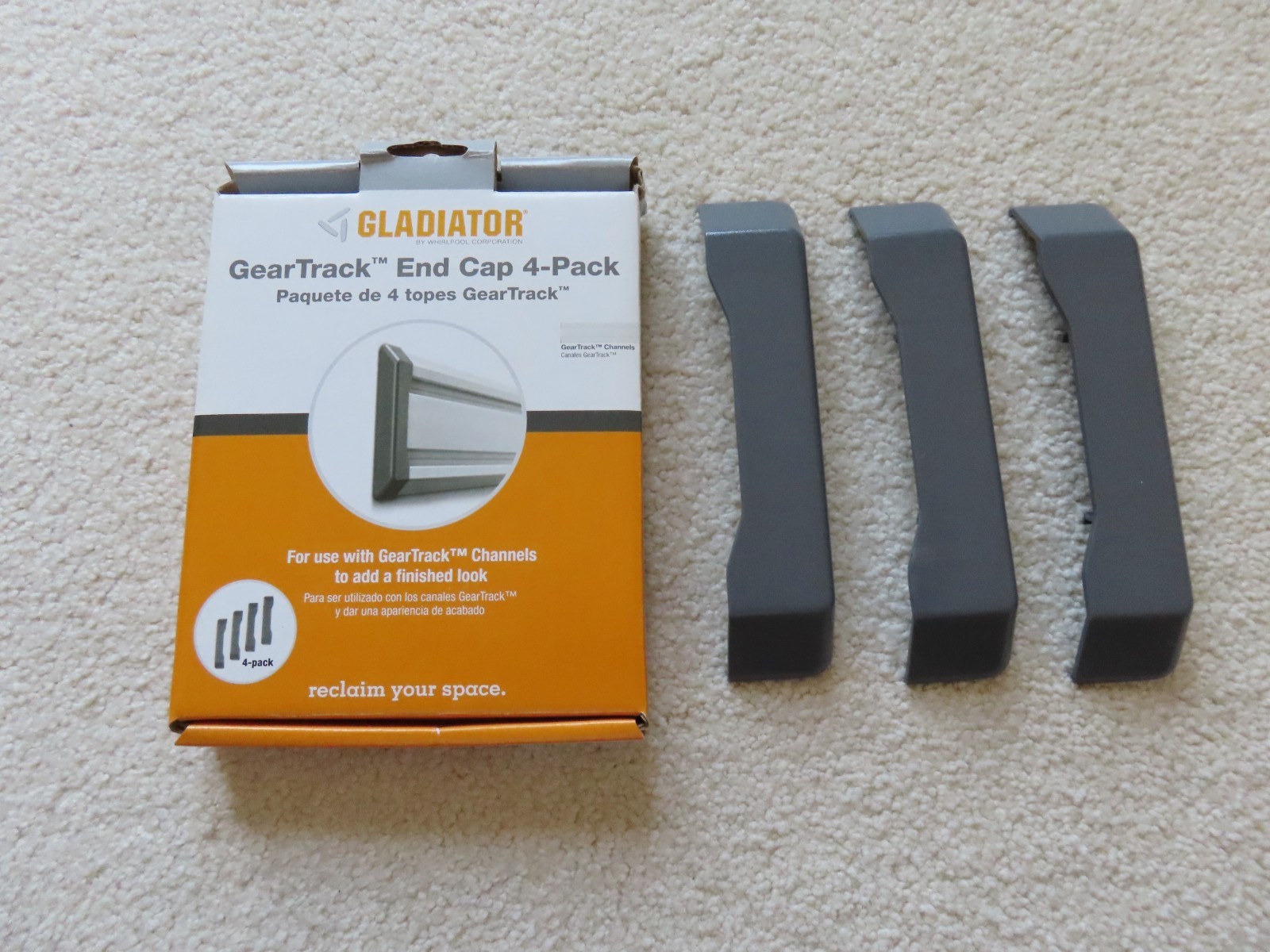 Open Box with Three (3) Individual Gladiator GearTrack Slide On End Caps