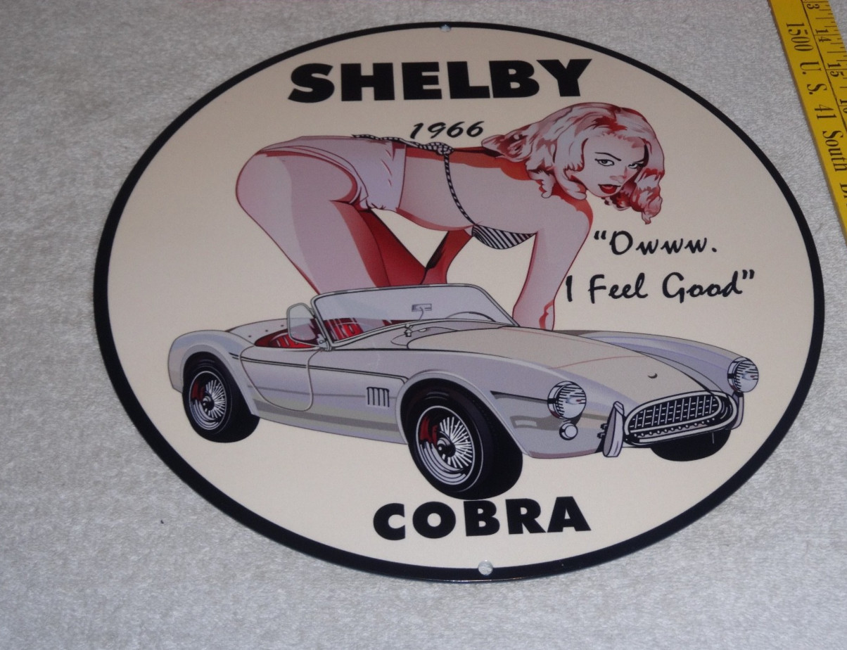 VINTAGE 1966 FORD SHELBY COBRA SPORTS CAR & WOMAN 12" METAL GASOLINE & OIL SIGN!