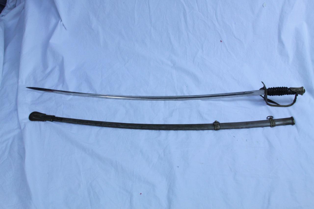 Imperial officer's sword with scabbard c.1900, the blade marked. Made in Germany