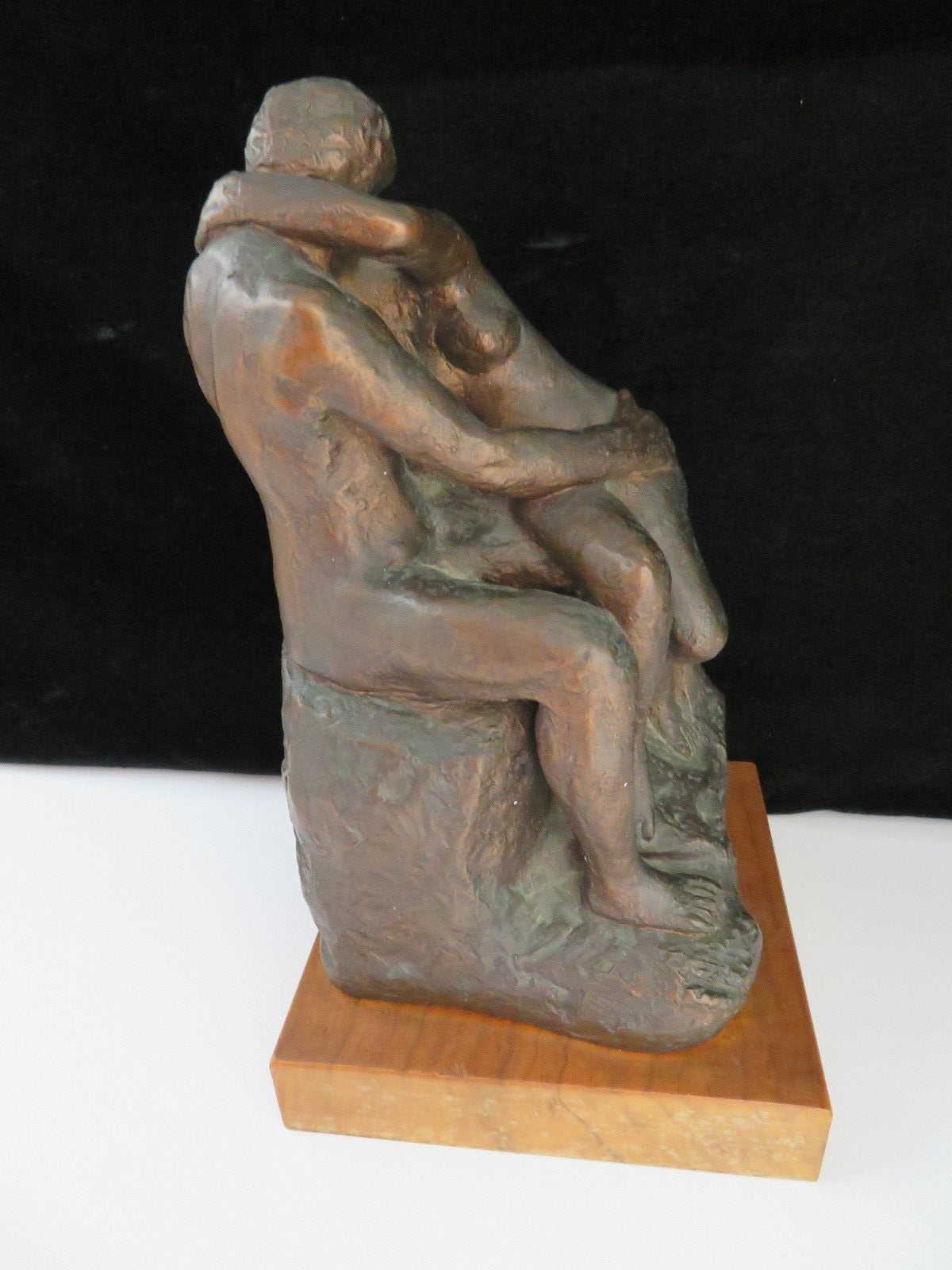 The Kiss Molded Statue on Wood Base