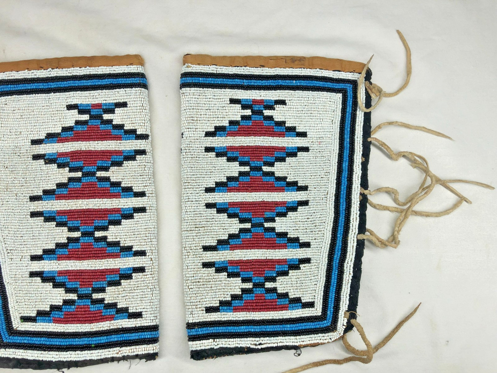 LATE 1800'S/EARLY 1900'S NATIVE AMERICAN MADE BEADED WRIST CUFFS W/ TRADE CLOTH