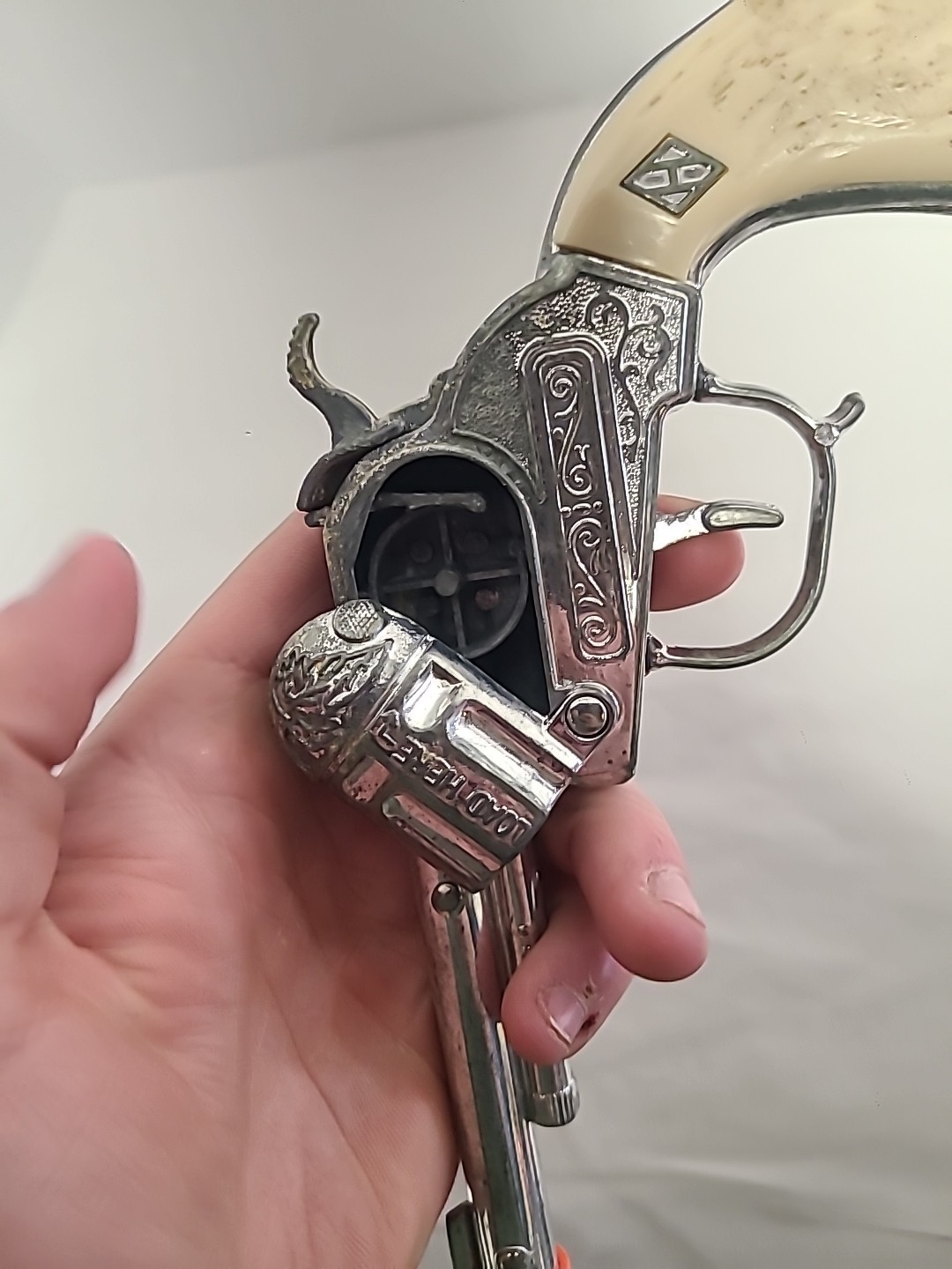 Vintage Halco Cowboy Die Cast Toy Cap Gun with Orange Plug & White Grip Handle—