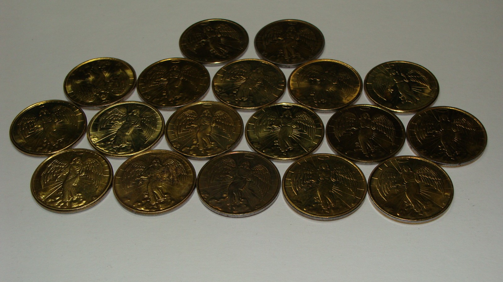 Guardian Angel token for luck and protection.