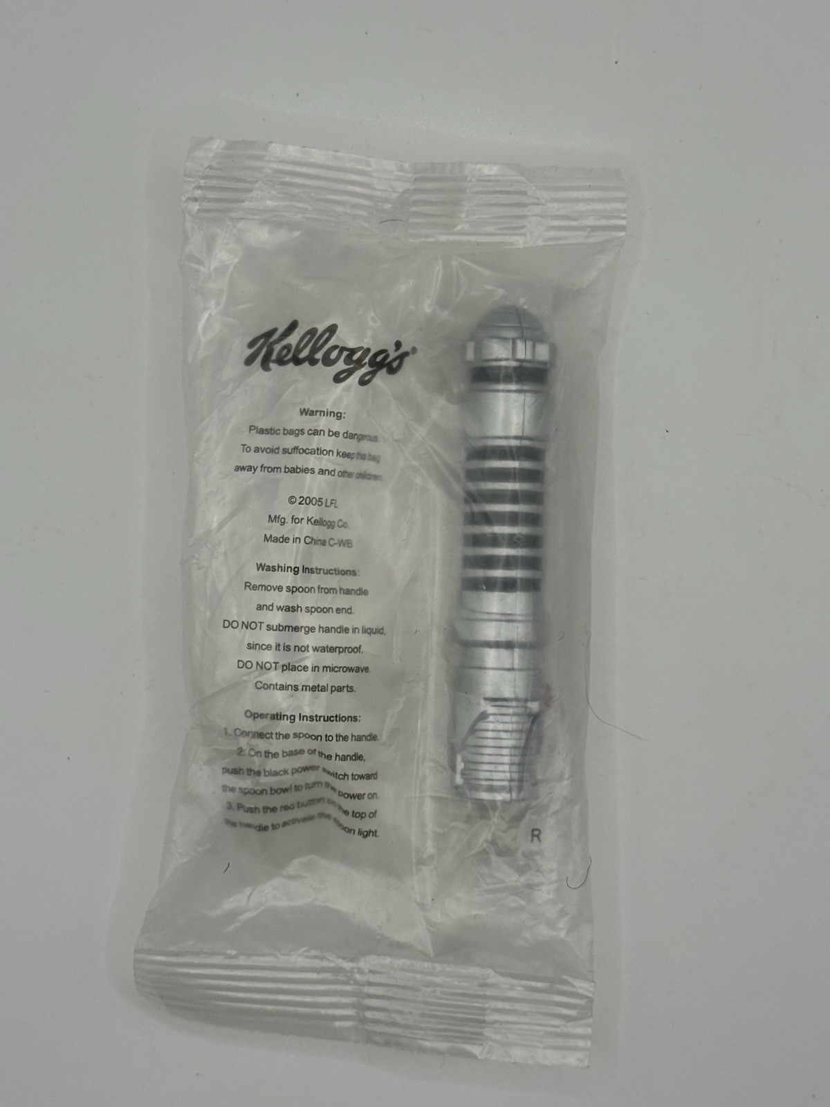 Sealed Vintage 2005 Star Wars Kelloggs Lightsaber Light Up Spoon, New Old Stock