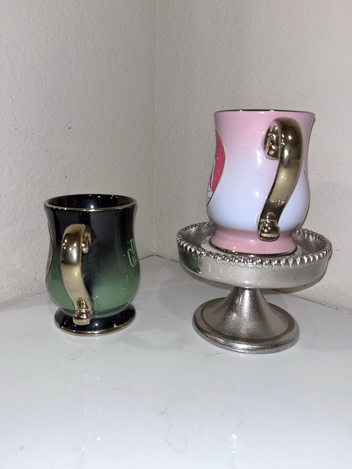 2-NWT Wicked Coffee/tea Green, Pink With Gold Handle Mug Set