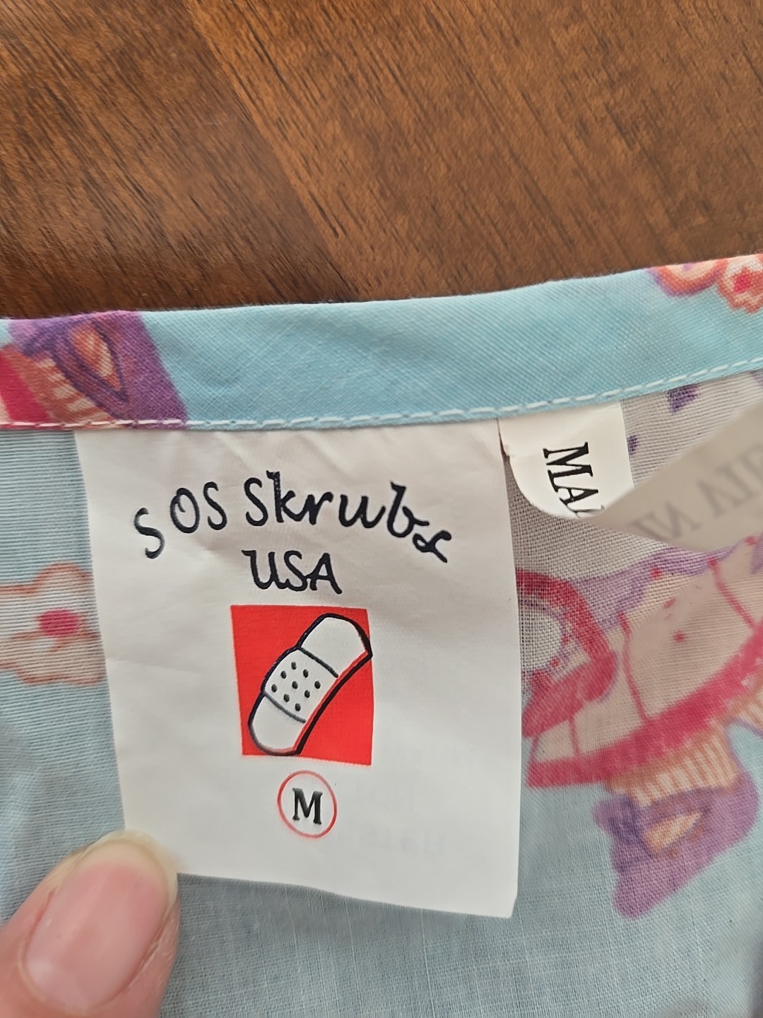 Women scrub tops Med SOS scubs USS