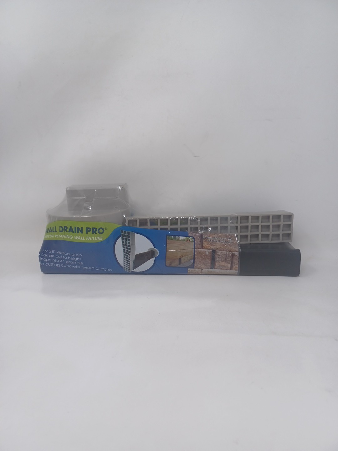 Reln Wall Drain 4 in. x 14 in. Universal Retaining Wall Block Channel Drain Gray