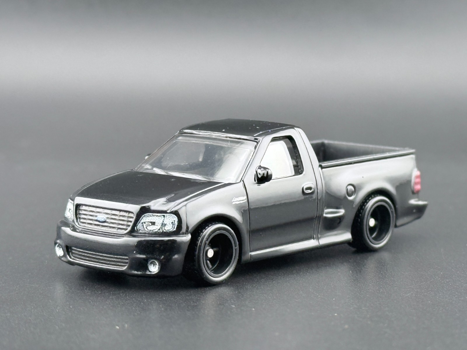 Hot Wheels 99 Ford F-150 Lightning Power Trip FPY86-961 R 1/64