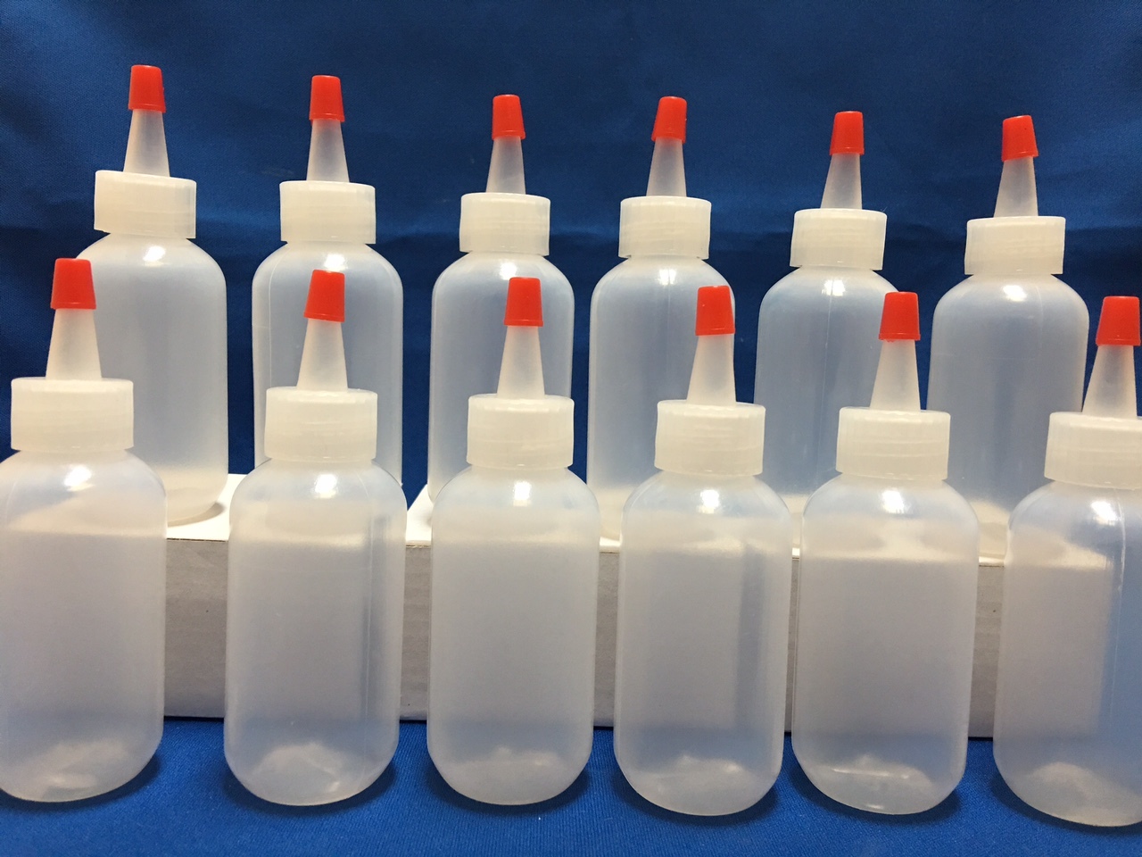 6 pack of 2oz (60mL) Plastic Boston Round Squeeze Bottles with Yorker Caps HDPE