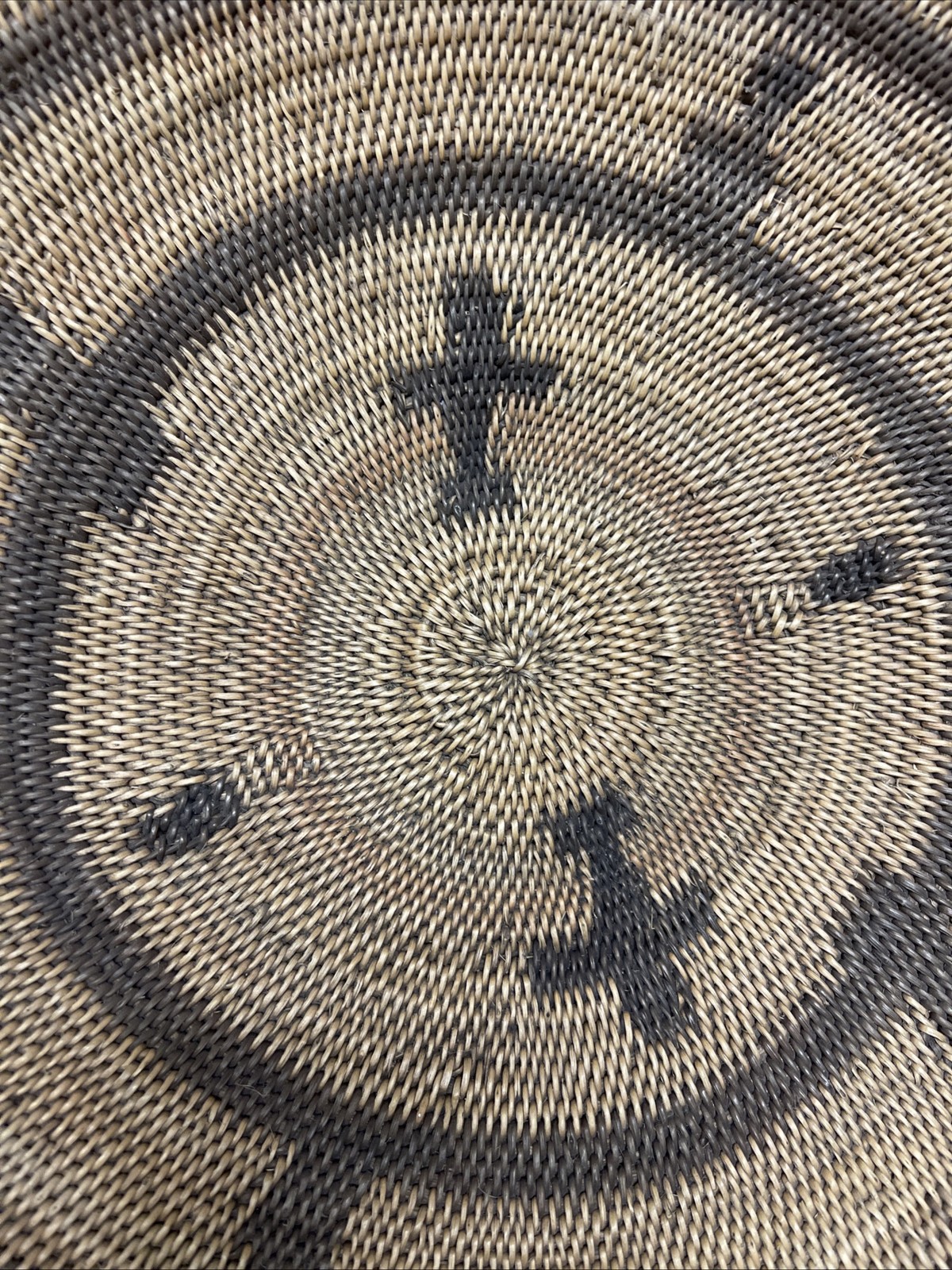Woven Apache pictorial 17 1/4” basket with geometric and symbolic designs.