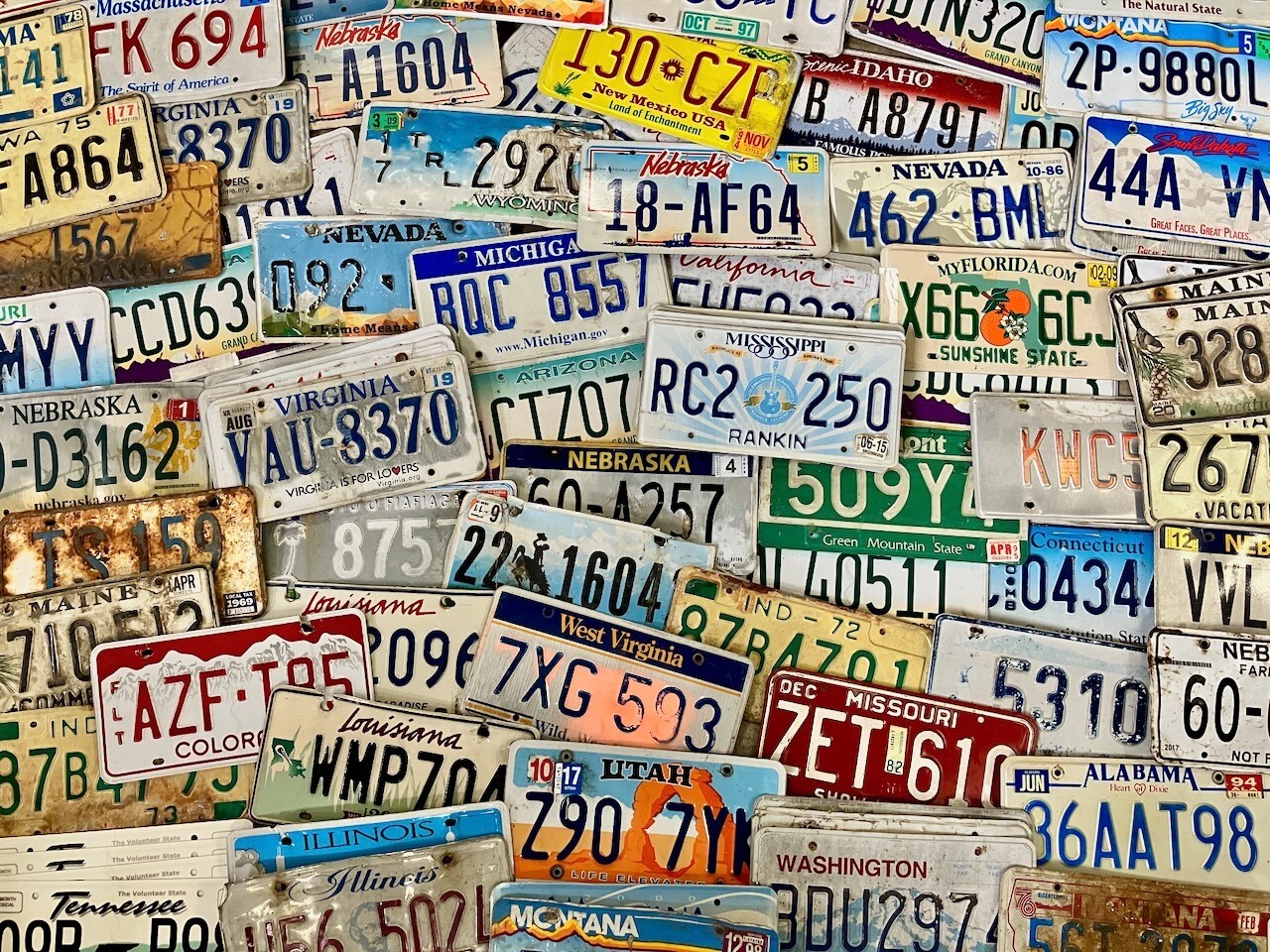 Bulk Lot of 100 Roadkill Condition License Plates From At Least 30 States