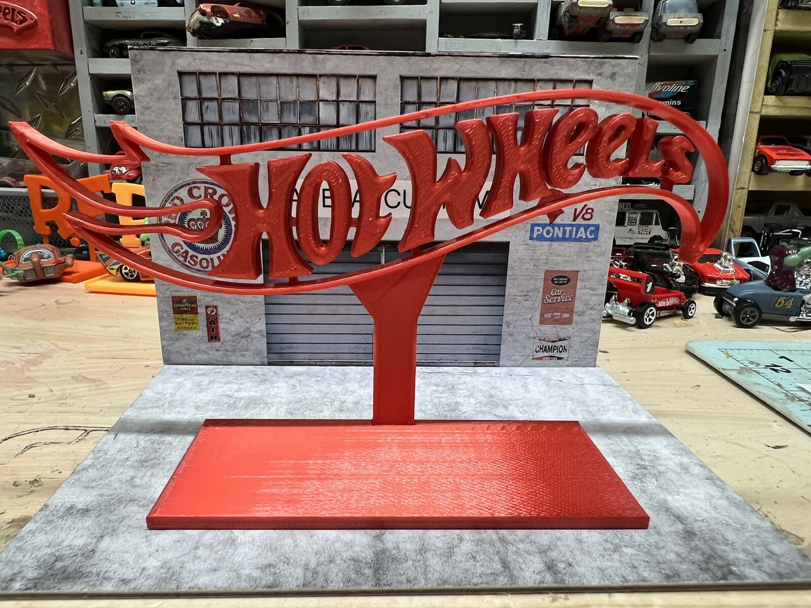 red hotwheels stand