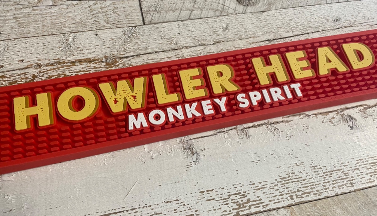 New Old Stock Howler Head Monkey Spirit Red Rubber Bar Tap Mat