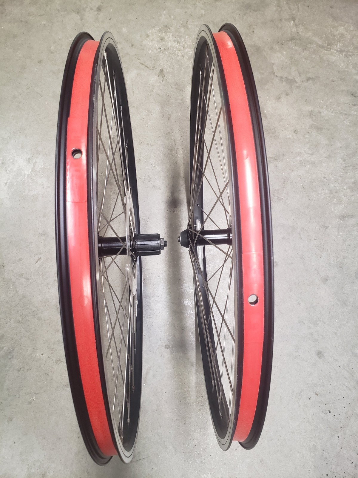 26" rim brake wheelset. Double wall. Black with silver sidewall and black hub.