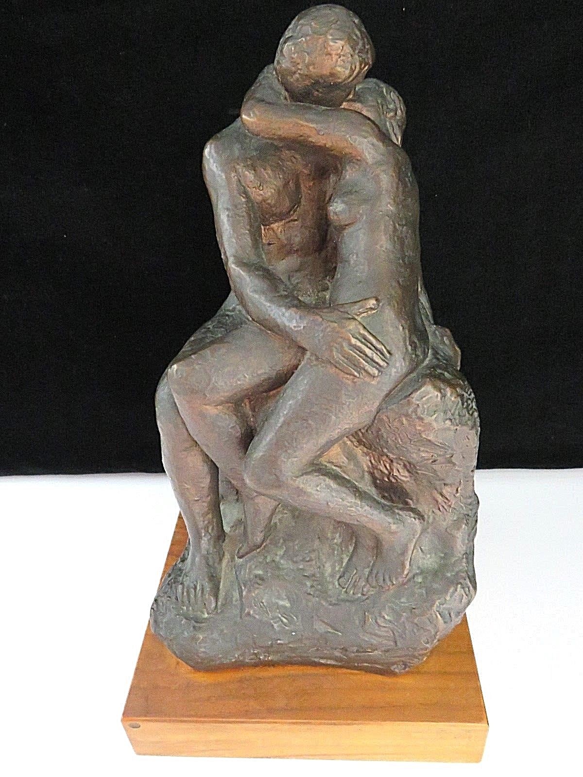 The Kiss Molded Statue on Wood Base
