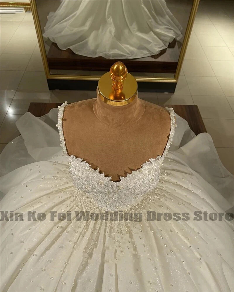 Luxury Wedding Dresses Sweetheart Spaghetti Straps Shiny Bead A-Line Bride Gown