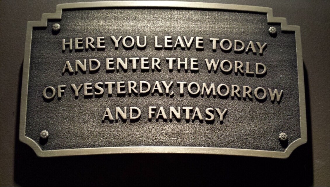 Disneyland entranceway sign plaque